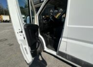 White cargo van interior with driver's door open