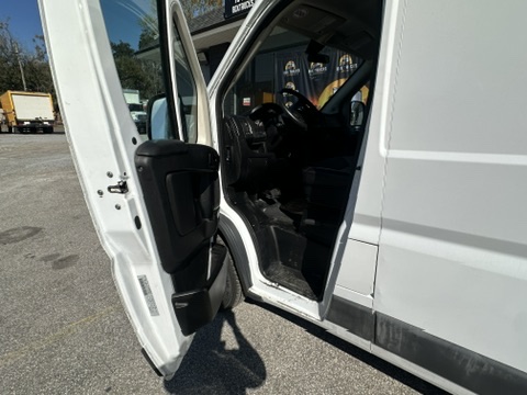 White cargo van interior with driver's door open