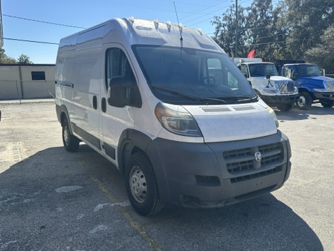 White Ram ProMaster van parked outdoors in a lot