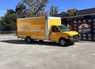 Yellow 2020 GMC Savana 3500 16ft box truck for sale at Box Trucks of Jacksonville.