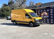 Yellow Ford Transit cargo van for sale at Box Trucks Jacksonville