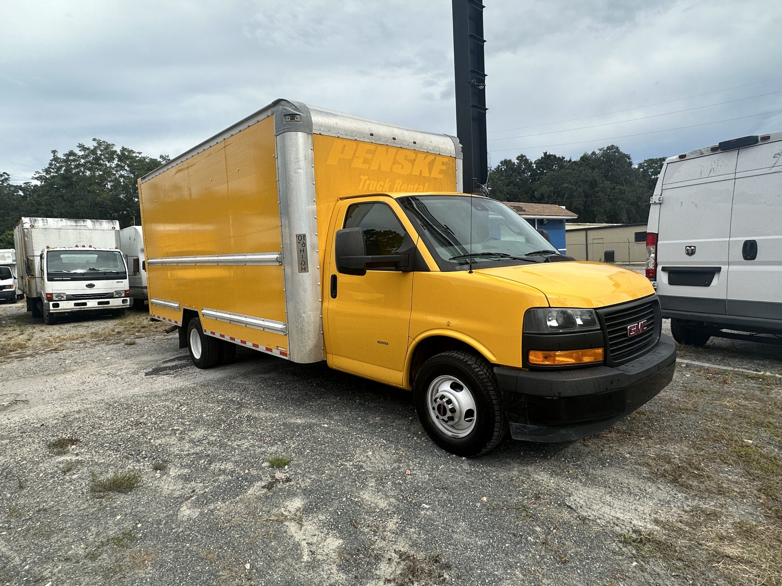 Yellow 2020 GMC Savana 3500 16ft. box truck rental by Penske