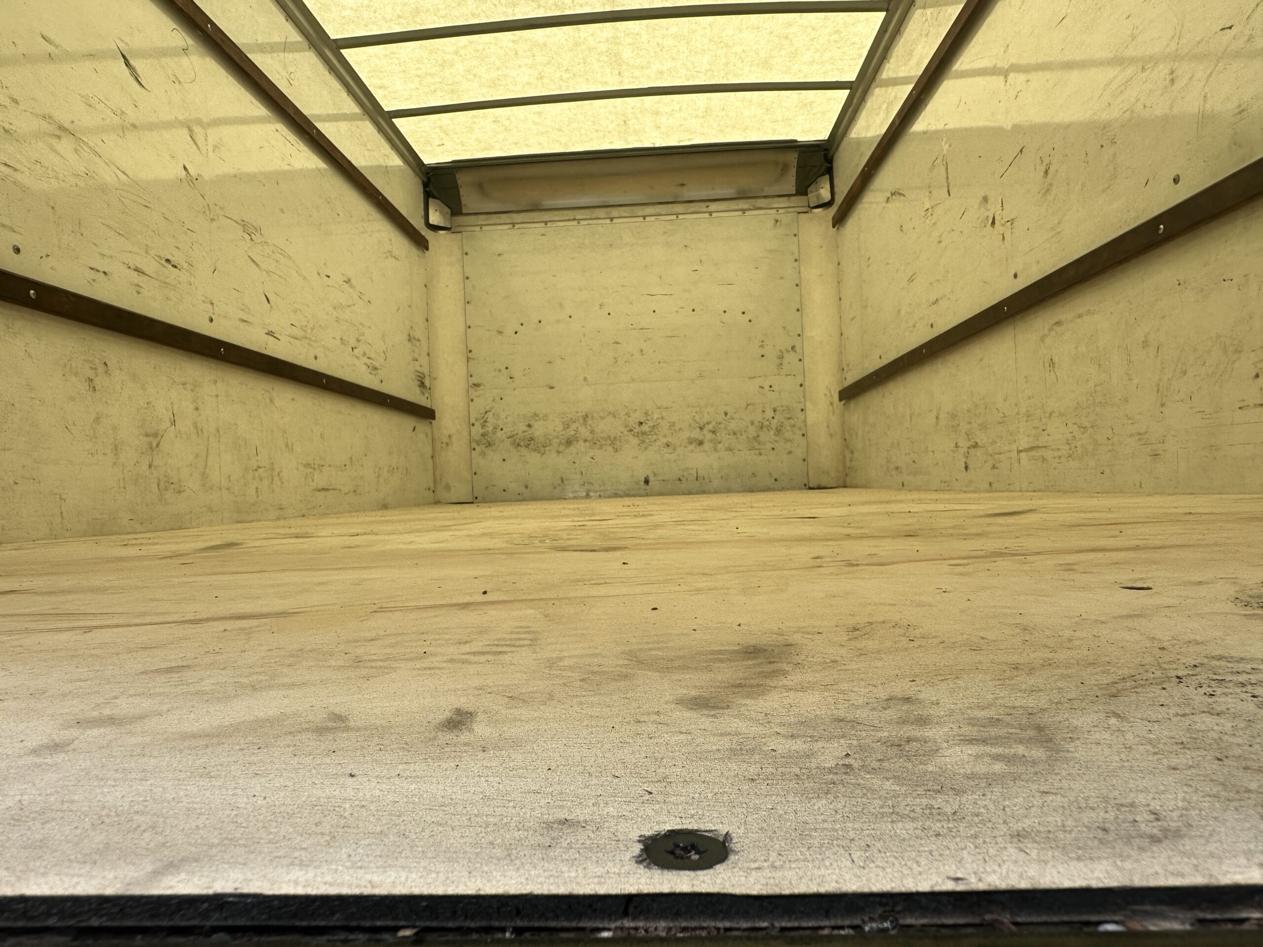 Interior view of a clean, empty 16ft. box truck cargo area.