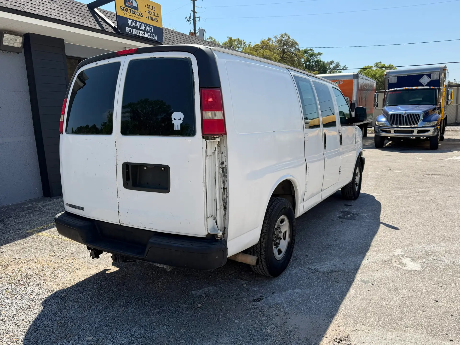Rear view of a white 2009 Chevy G2500 cargo van for sale at Box Trucks Jax.