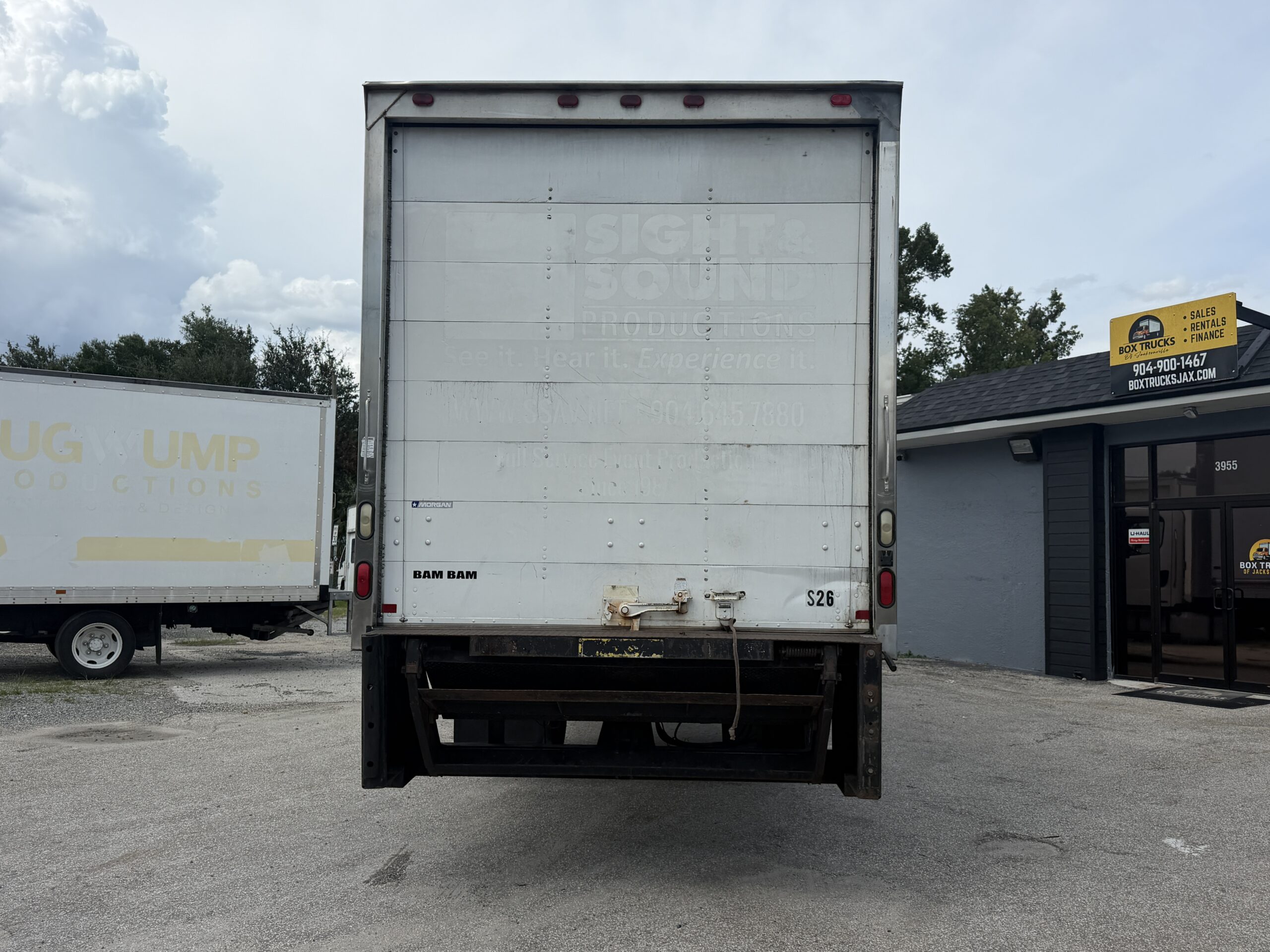 Rear view of a 2007 Freightliner M2 26ft box truck with liftgate, Stk# X68661