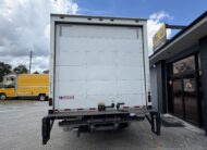 Rear view of a 2019 Isuzu NQR 16ft. diesel box truck with liftgate.