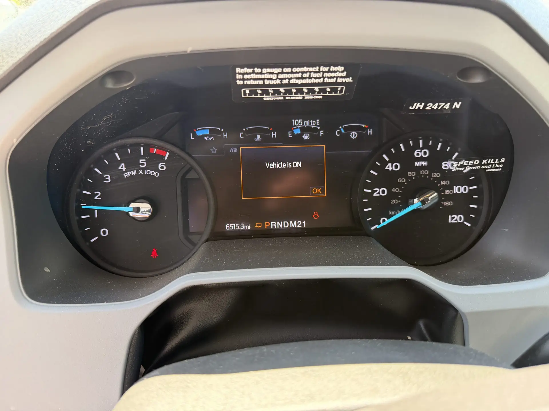Ford Super Duty dashboard: Vehicle is ON, 65,153 miles, 105 mi to E