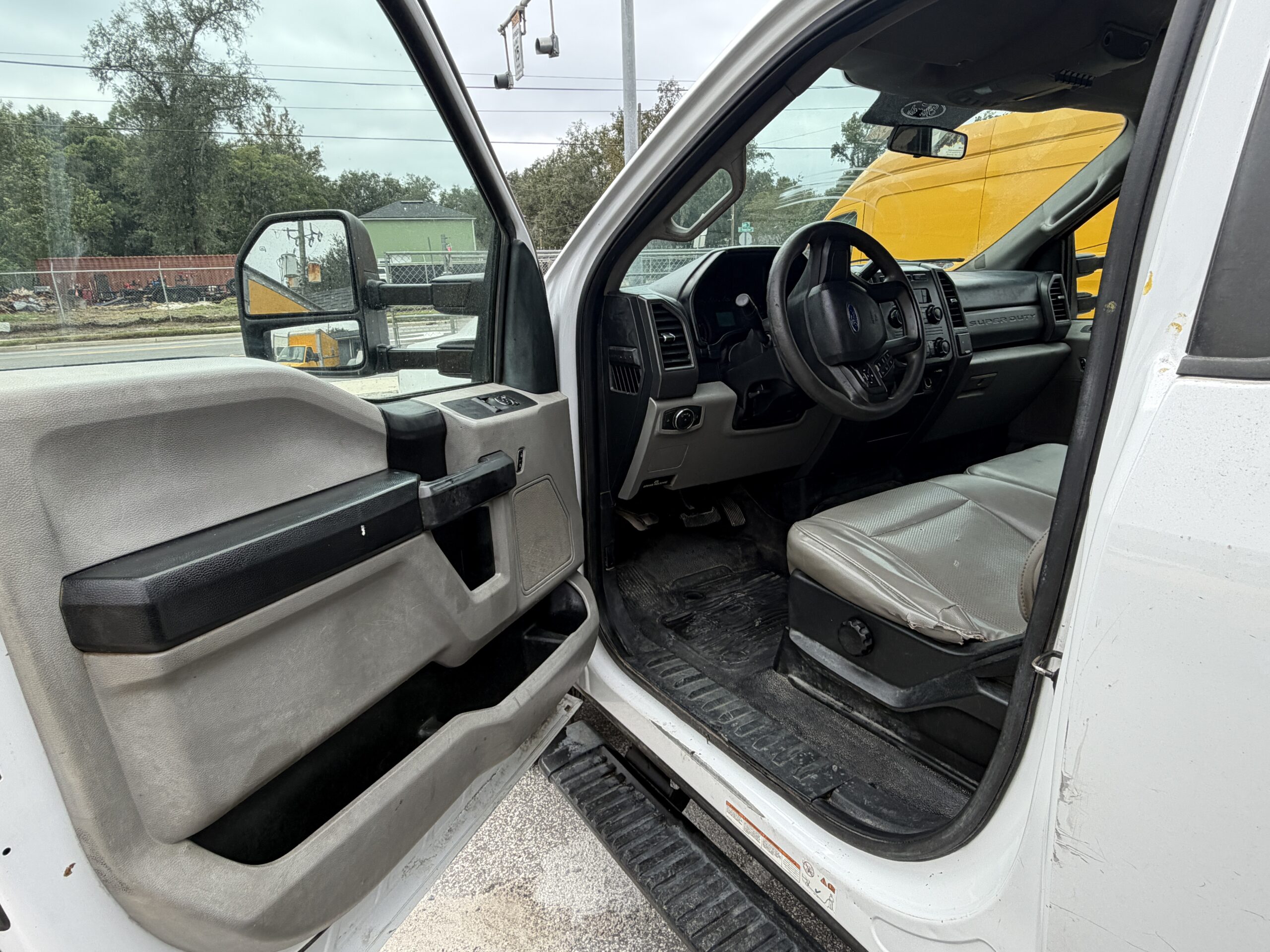 2019 Ford F-550 truck interior with open driver's door